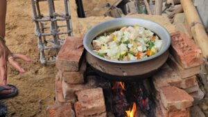 ঐতিহ্যের স্বাদে মুখর পাহাড়ি জনপদ: রাঙামাটির ঘরে ঘরে চলছে বিজুর প্রাণ ‘পাজন’ তৈরি ও আপ্যায়ন